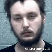 Adam Baker booking photo