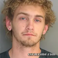 Adam Baker booking photo