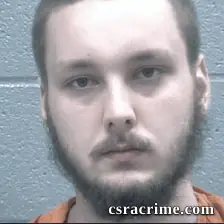 Adam Baker booking photo