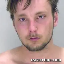 Adam Baker JR booking photo