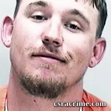 Adam Herman booking photo