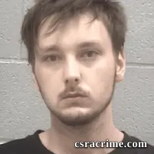 Adam James Baker JR booking photo