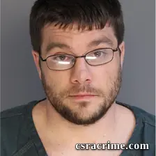 Adam Poore booking photo