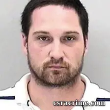 Adam Price booking photo