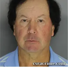 Alan Rickman booking photo