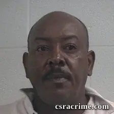 Amos K Kaba booking photo
