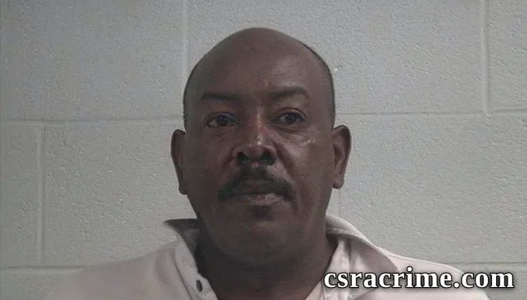 Amos K Kaba booking photo