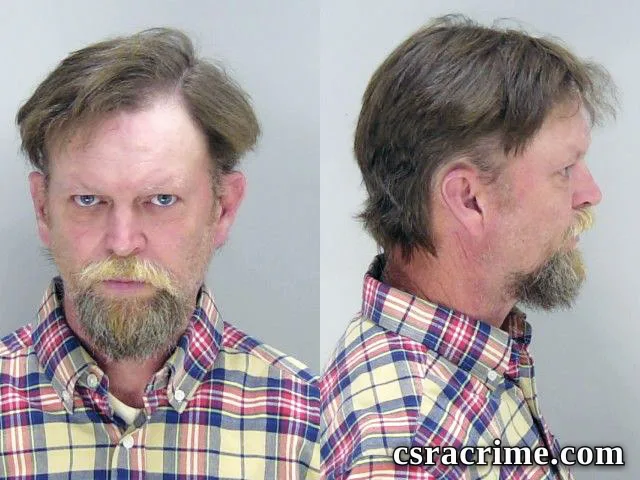 Archibald Baker booking photo