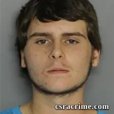 Austin Baker booking photo