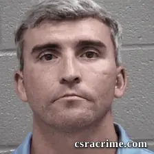 Austin English booking photo