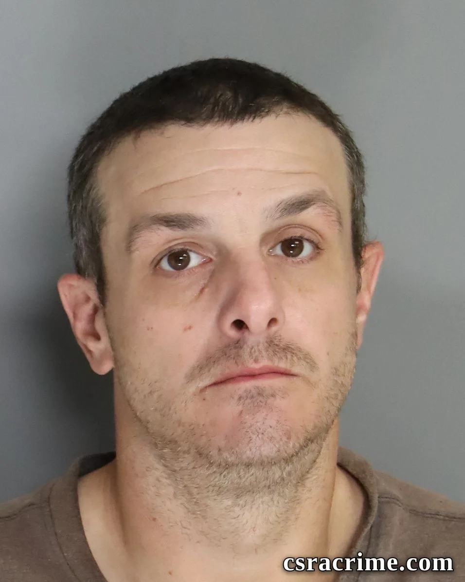 Avery Bragg booking photo