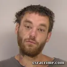 Brandon James, Tompkins III booking photo