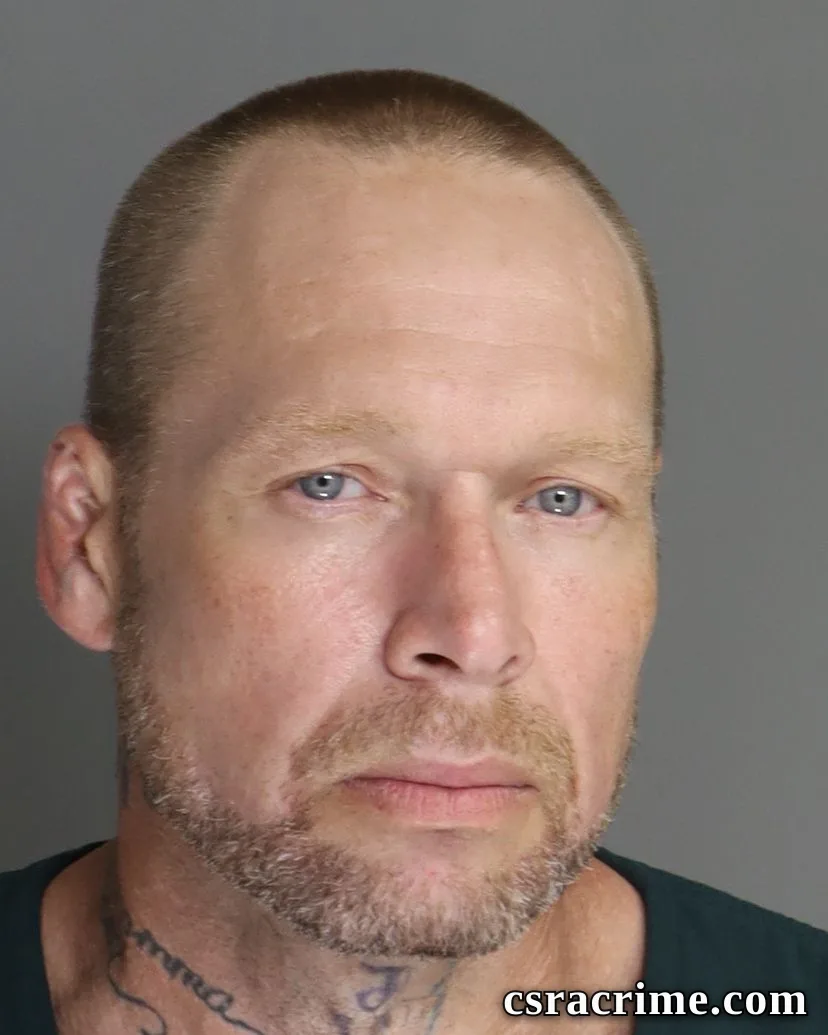 Caleb Belote booking photo