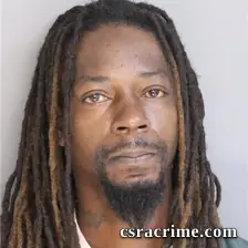 Carlos Garnett booking photo