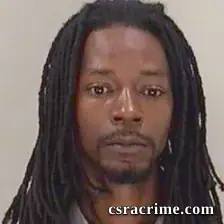 Carlos Garnett booking photo
