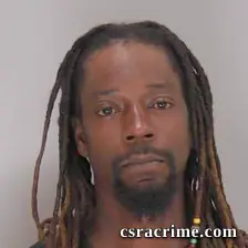 Carlos Garnett booking photo