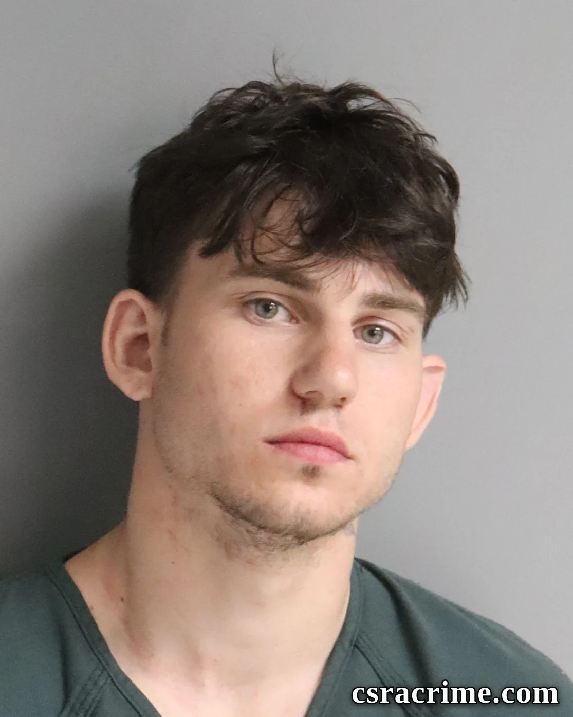 Carter Higgins booking photo