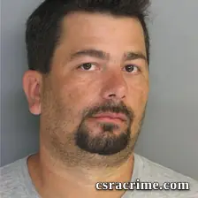 Clint Barton booking photo