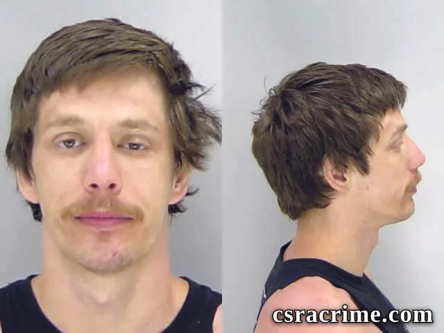 Colson Burdell booking photo