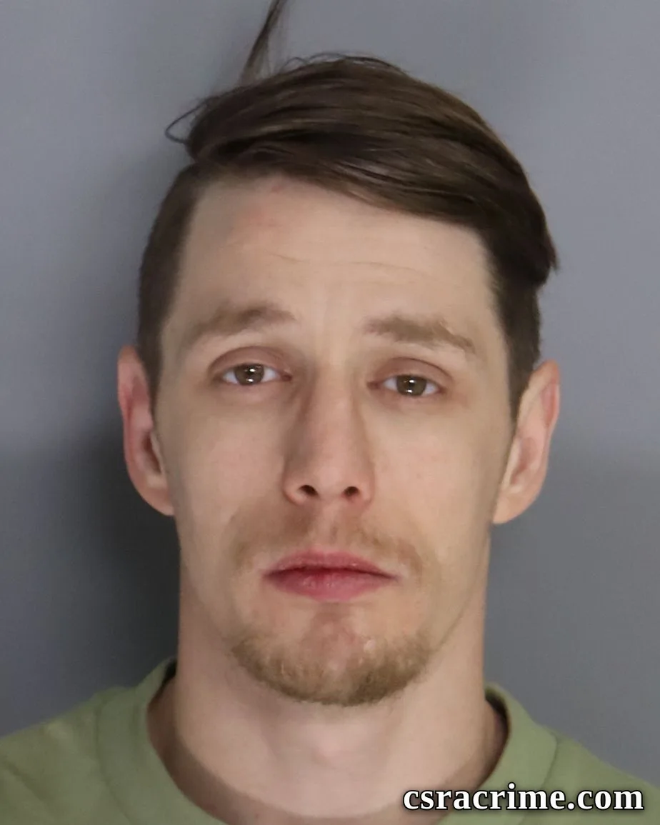 Colson Burdell booking photo