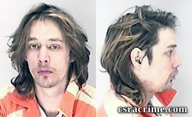 Colson Burdell booking photo