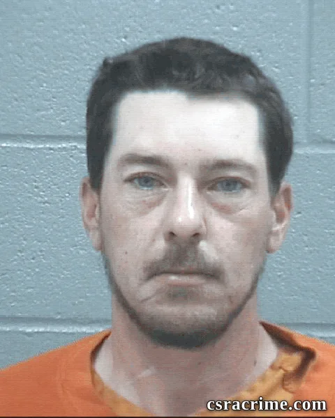 Corey Mauser booking photo