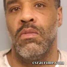 Credick Mandal Hilton booking photo