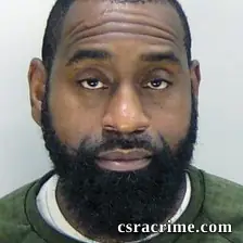 Damian Green booking photo