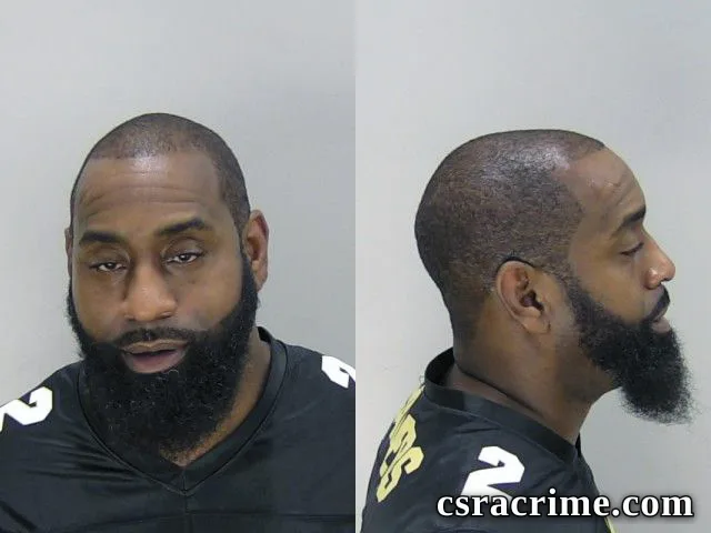 Damian Green booking photo
