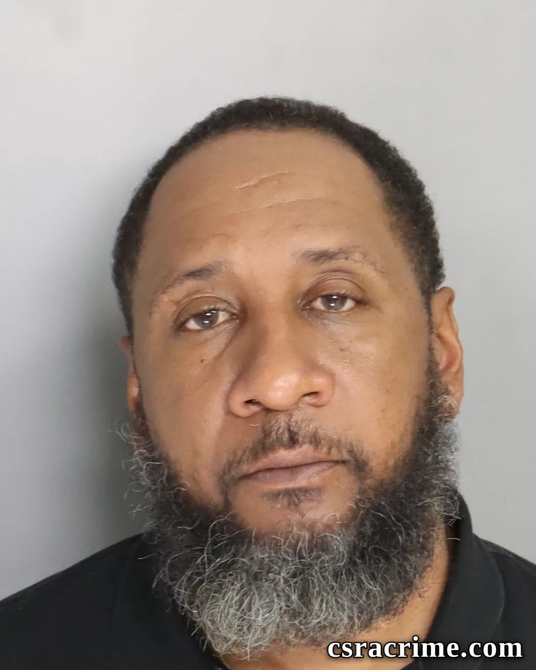 Damian Green booking photo