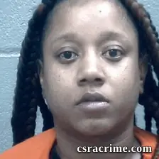 Deja Lewis booking photo