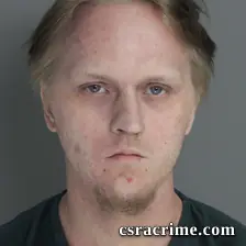 Devon Baker booking photo