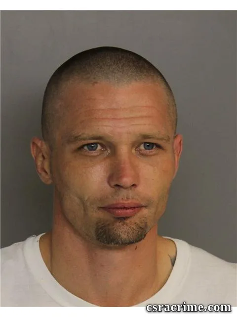 Dewey Brown booking photo