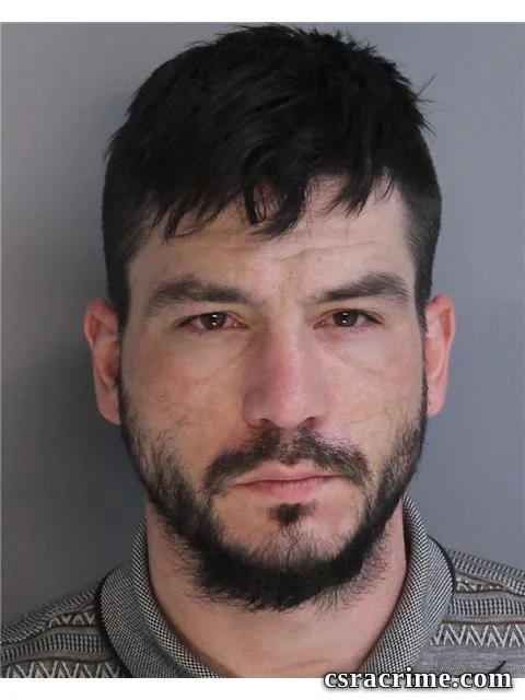 Evan Tapley booking photo