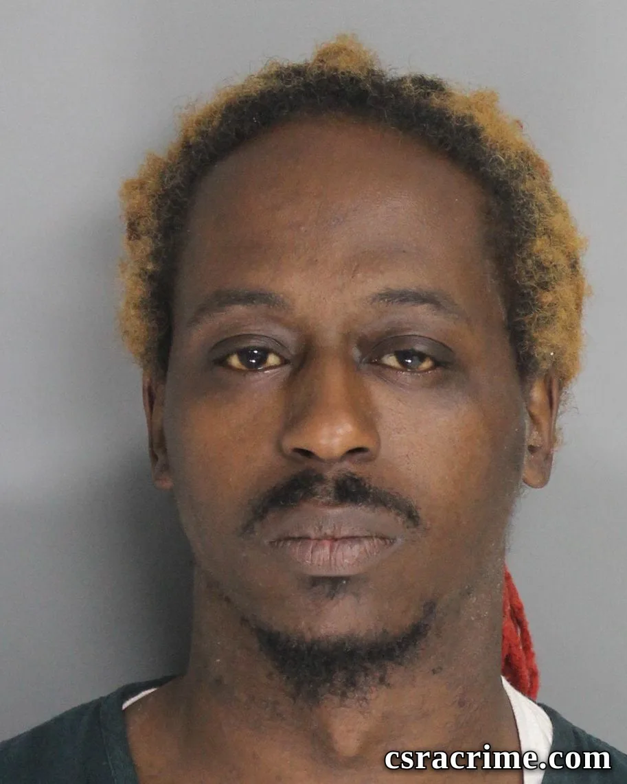 Frank Holmes booking photo
