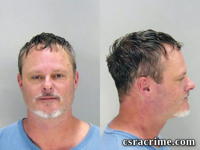 Gene Hollins booking photo