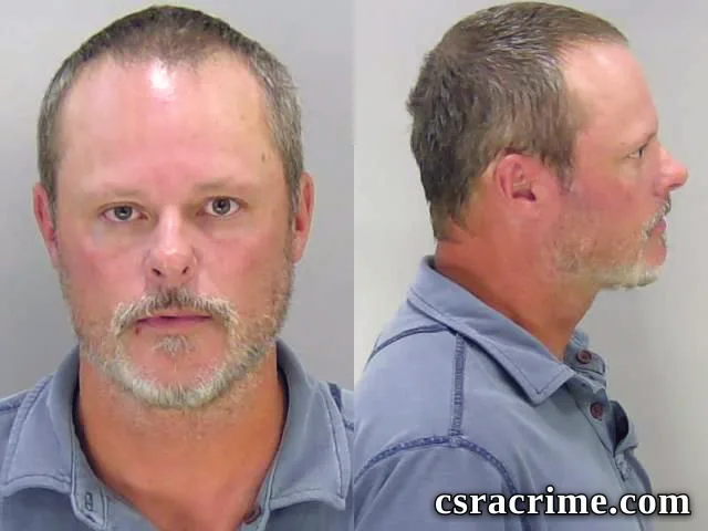 Gene Hollins booking photo