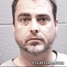 George Huntington booking photo