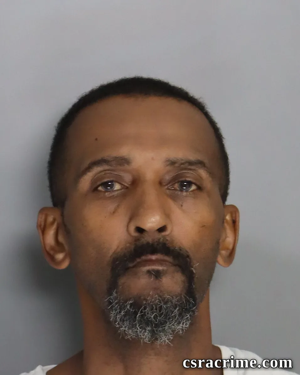Harvey Butler JR booking photo