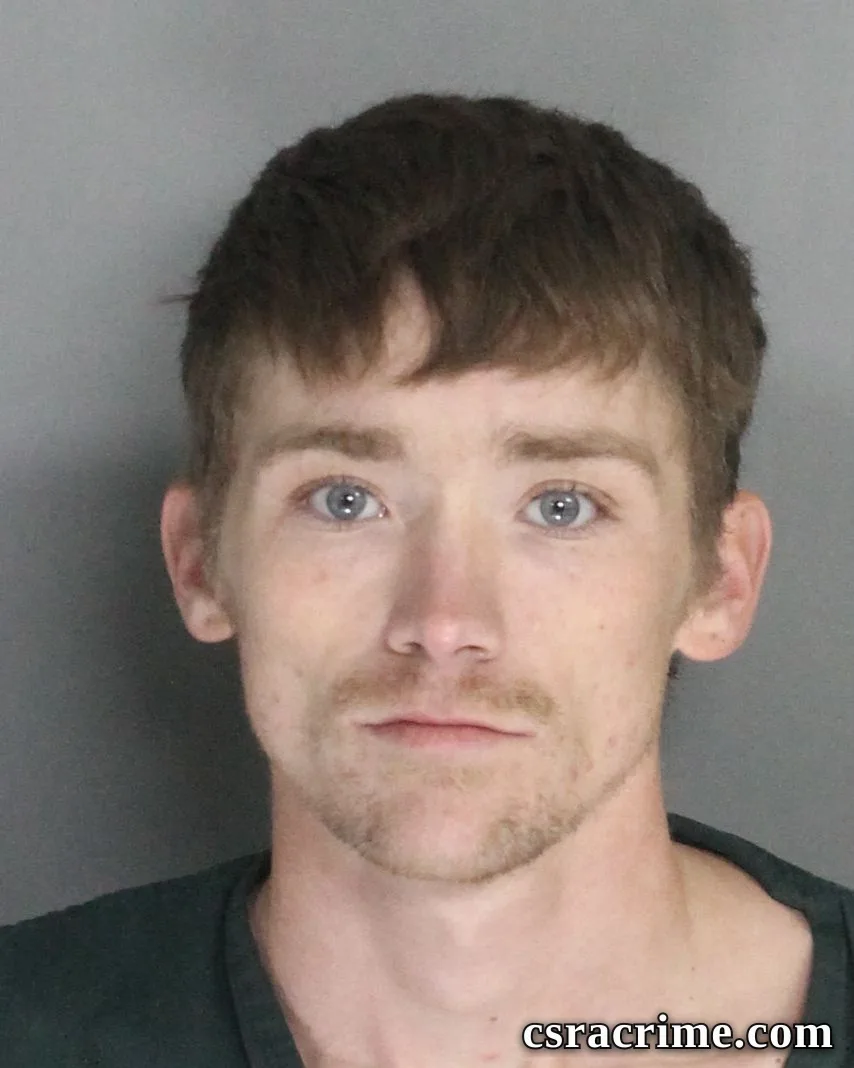 Hunter Holmes booking photo