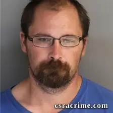 Jacob Pou booking photo