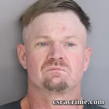 James Corbett booking photo
