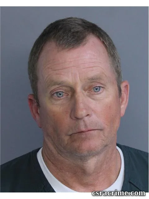 John Jones III booking photo