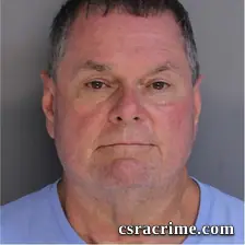 John Kennedy JR booking photo