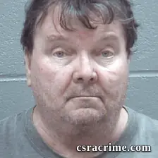 John Oliver booking photo