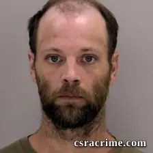 John Othman, Schneider II booking photo