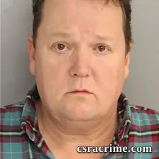 John Stewart booking photo