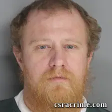 John Stewart booking photo