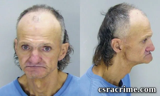 Johnny Rewis booking photo