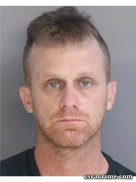 Johnny Sherlock booking photo